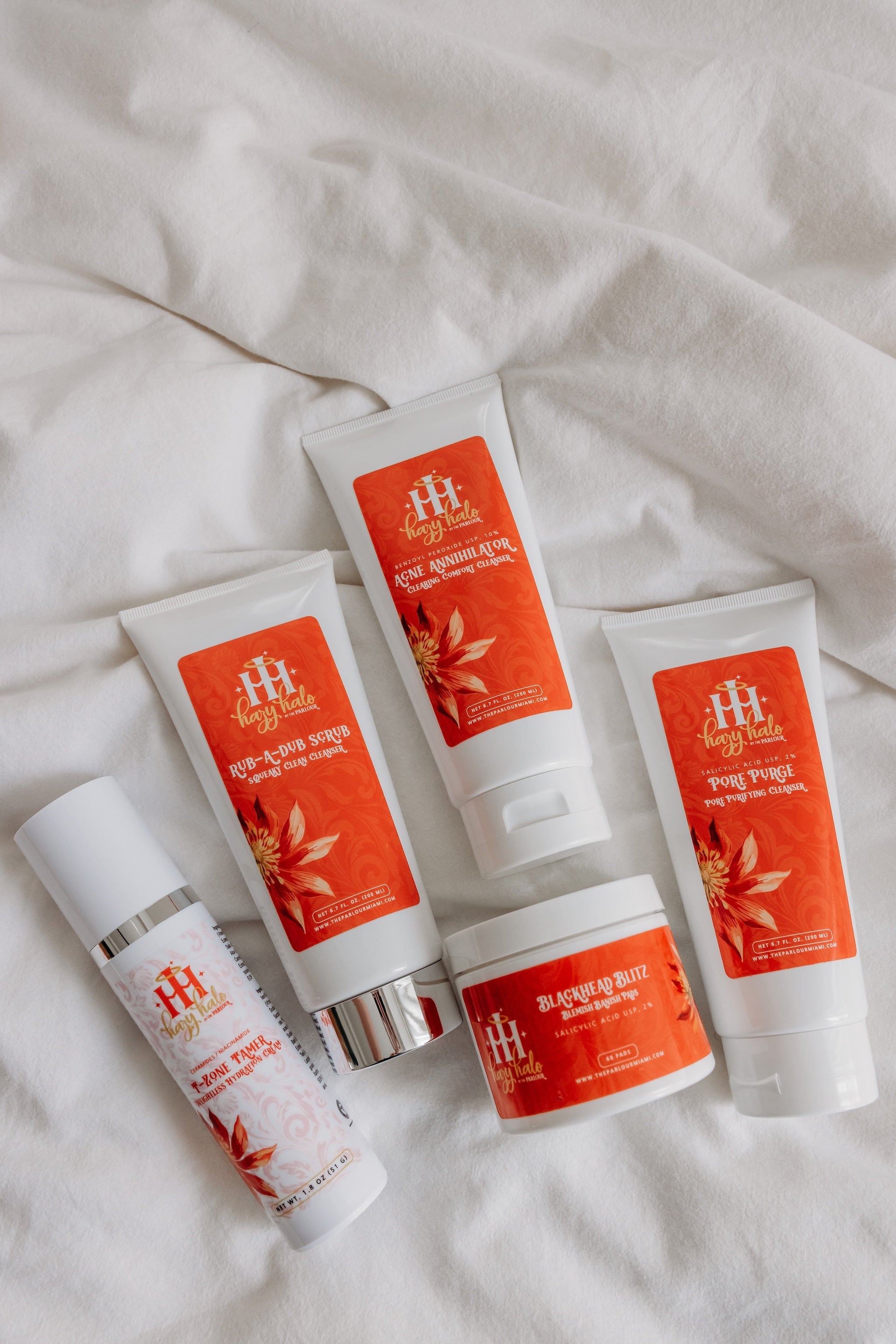 Acne and oily skin skincare collection with benzoyl peroxide, salicylic acid and exfoliating cleansers.