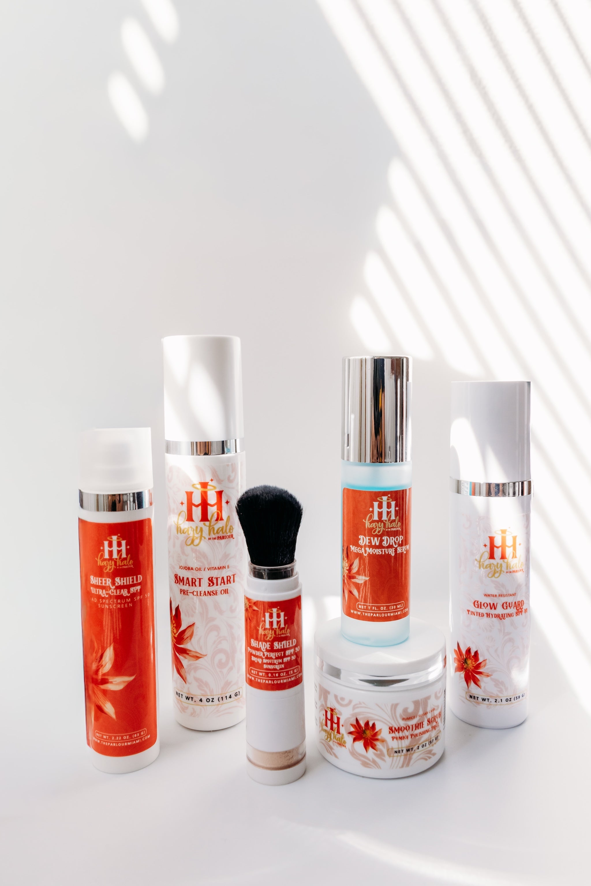 Daily skincare essentials including SPF, cleansing oil, hydrating serum and exfoliator.