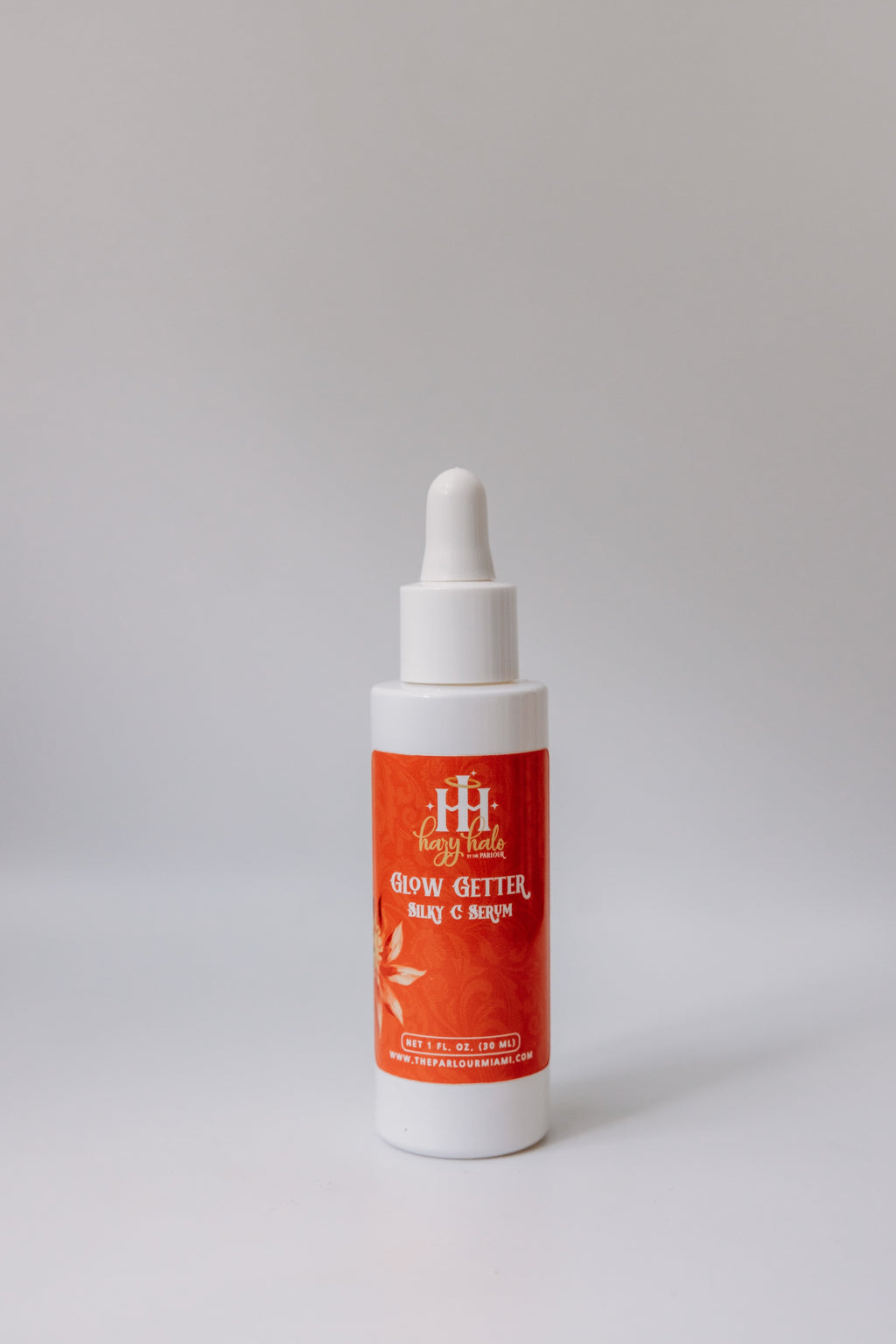 Glow Getter Silky C Serum by The Parlour with cap on featuring advanced Vitamin C antioxidants for brightening skin, improving uneven tone, and supporting radiant glowing skin.