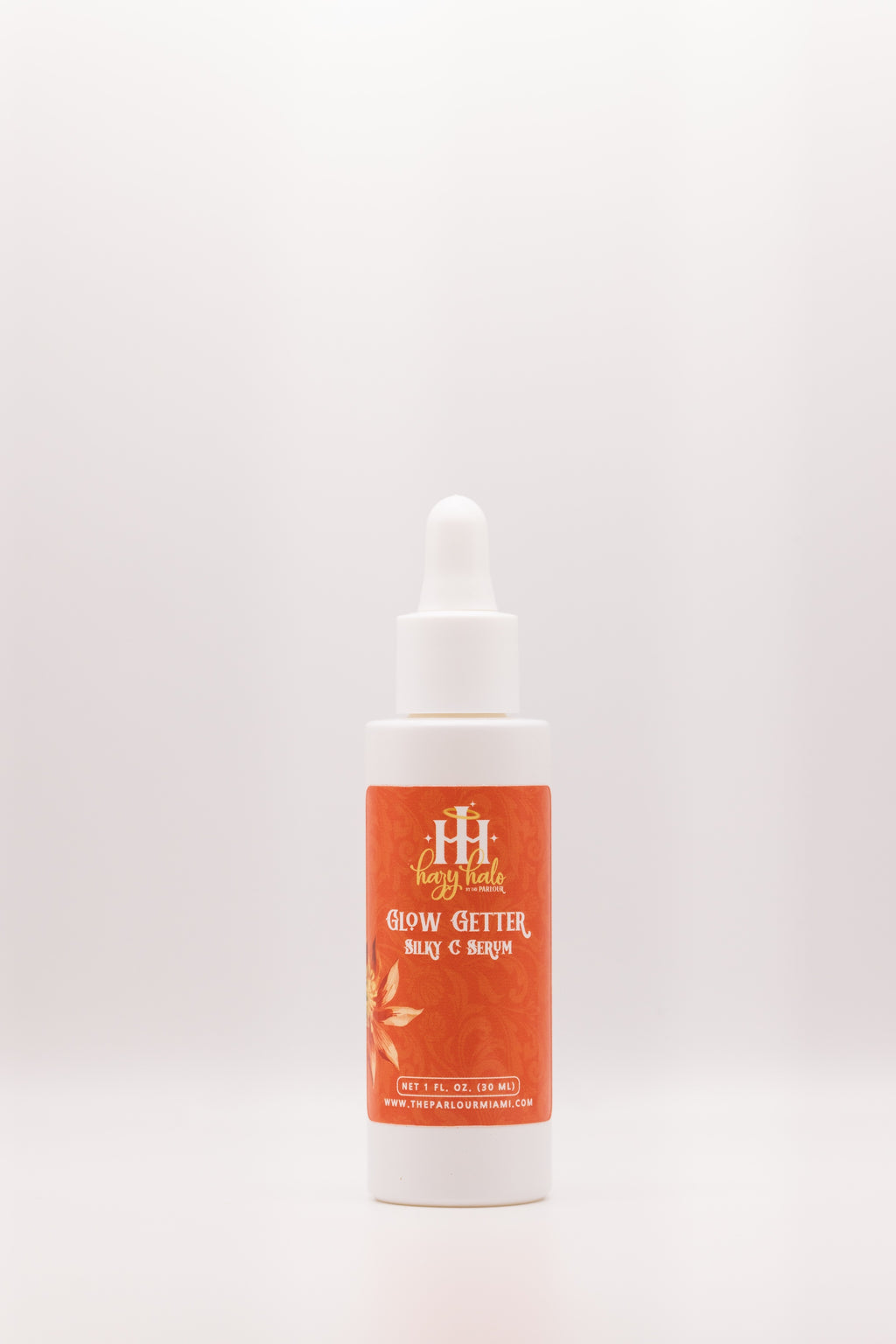 Glow Getter Silky C Serum by The Parlour with cap on featuring advanced Vitamin C antioxidants for brightening skin, improving uneven tone, and supporting radiant glowing skin