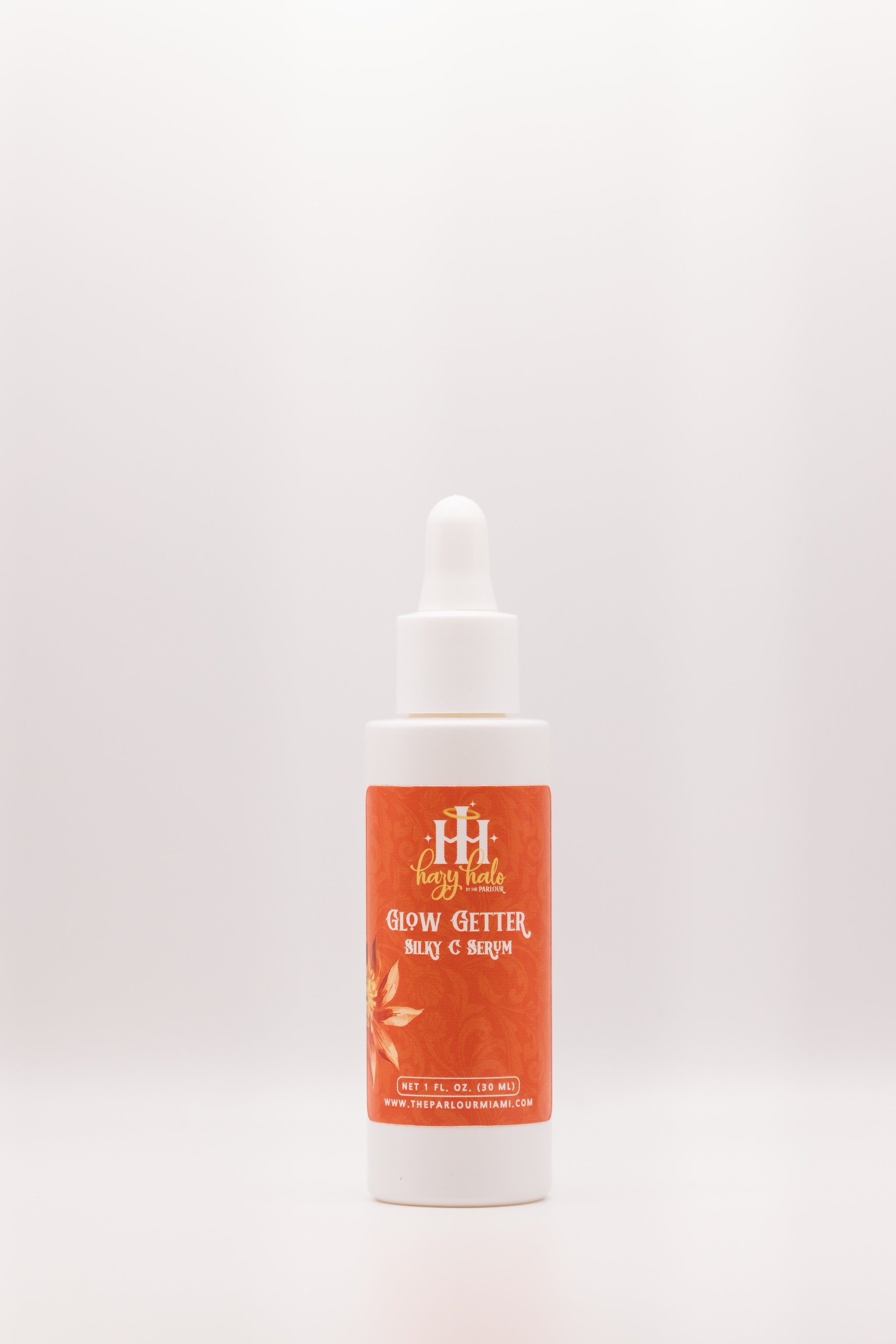 Glow Getter Silky C Serum by The Parlour with cap on featuring advanced Vitamin C antioxidants for brightening skin, improving uneven tone, and supporting radiant glowing skin