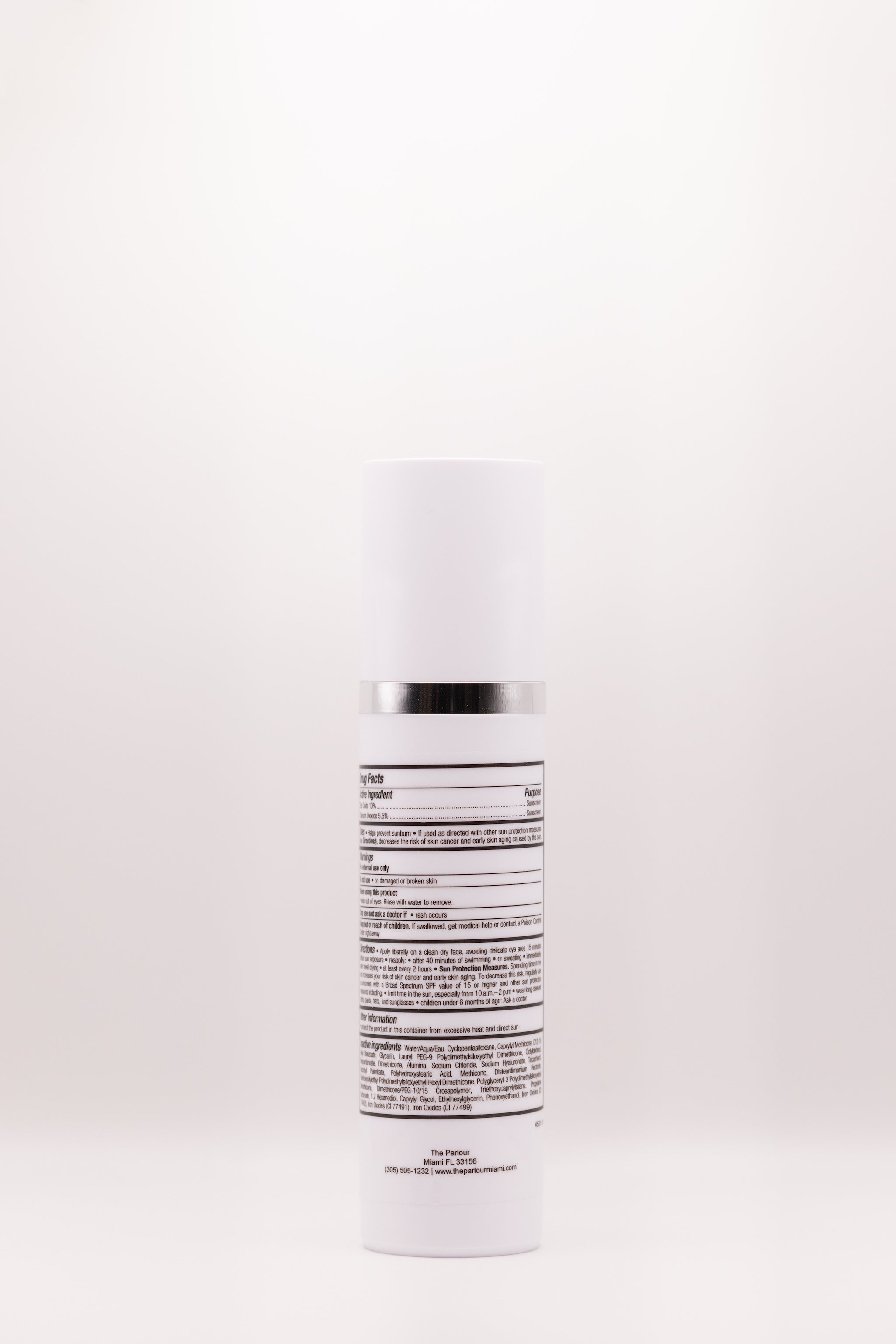 Back label of Glow Guard Tinted Hydrating SPF 44 by The Parlour featuring ingredient list including zinc oxide, titanium dioxide, and iron oxides for broad-spectrum sun protection and skin tone support