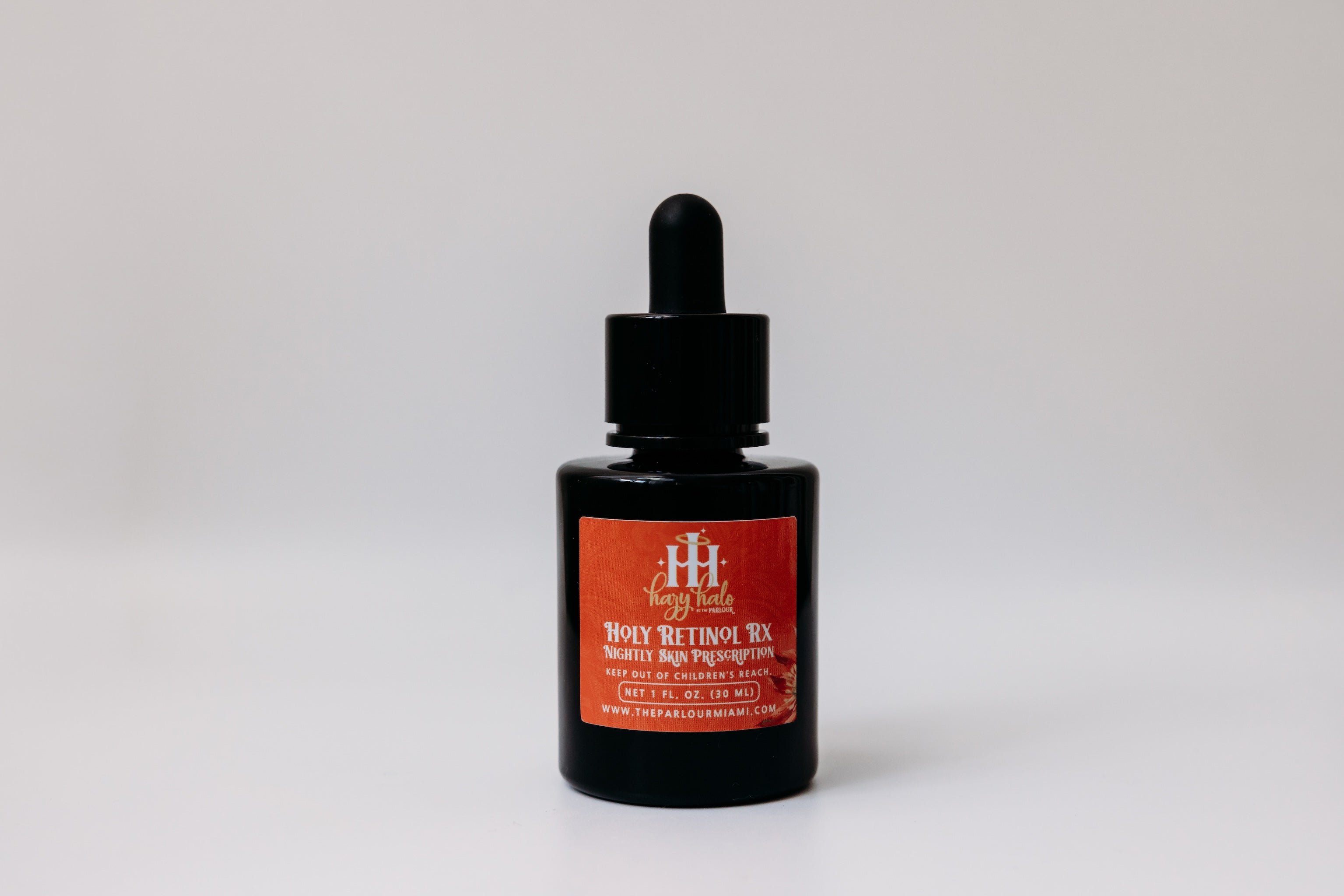 Holy Retinol Rx Nightly Skin Prescription by The Parlour featuring all-trans retinol and bakuchiol for improving fine lines, uneven texture, pores, and skin tone.