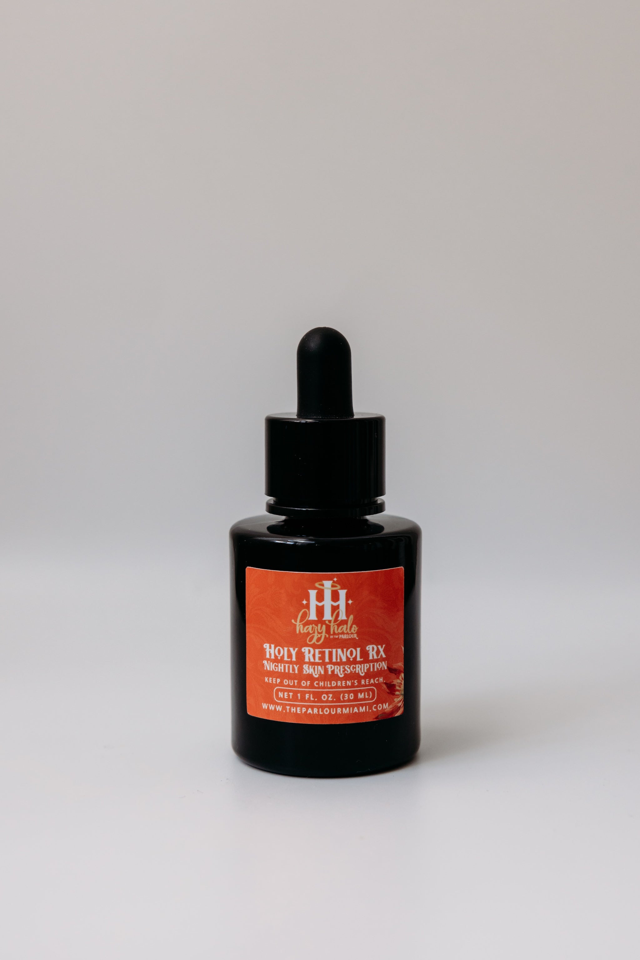 Holy Retinol Rx Nightly Skin Prescription by The Parlour featuring all-trans retinol and bakuchiol for improving fine lines, uneven texture, pores, and skin tone