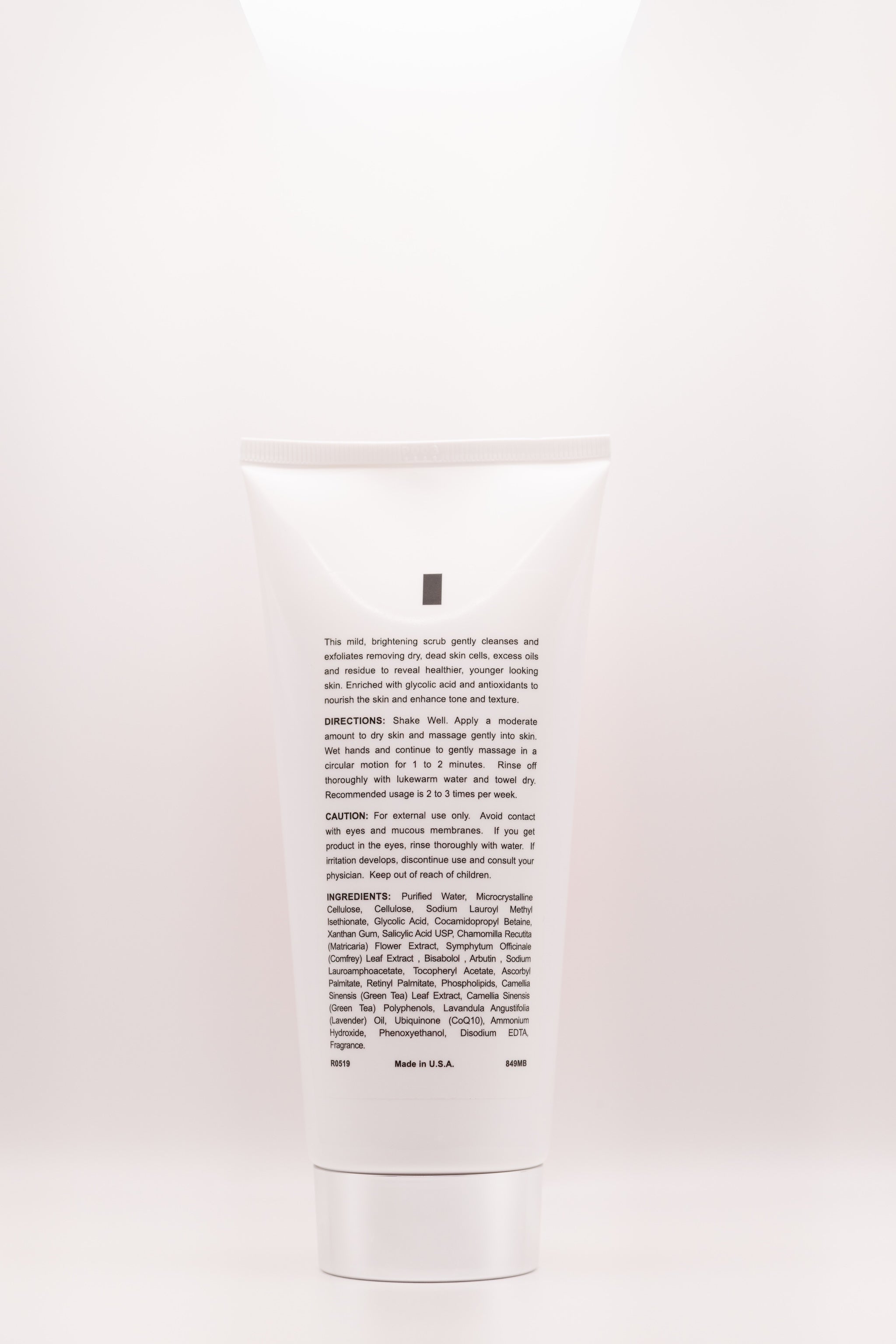 Back label of Rub-A-Dub Scrub exfoliating cleanser by The Parlour Miami with glycolic and salicylic acid, showing ingredients and directions for smoothing texture and refining pores