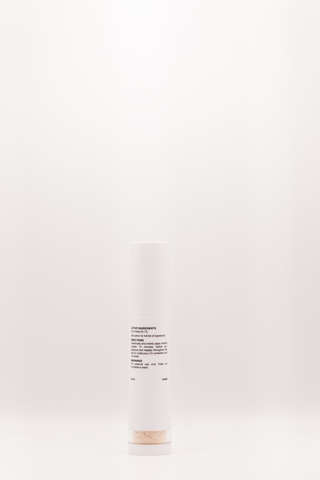 Back label of Shade Shield Portable Powder SPF 30 by The Parlour featuring product information and mineral sunscreen details in portable brush applicator packaging