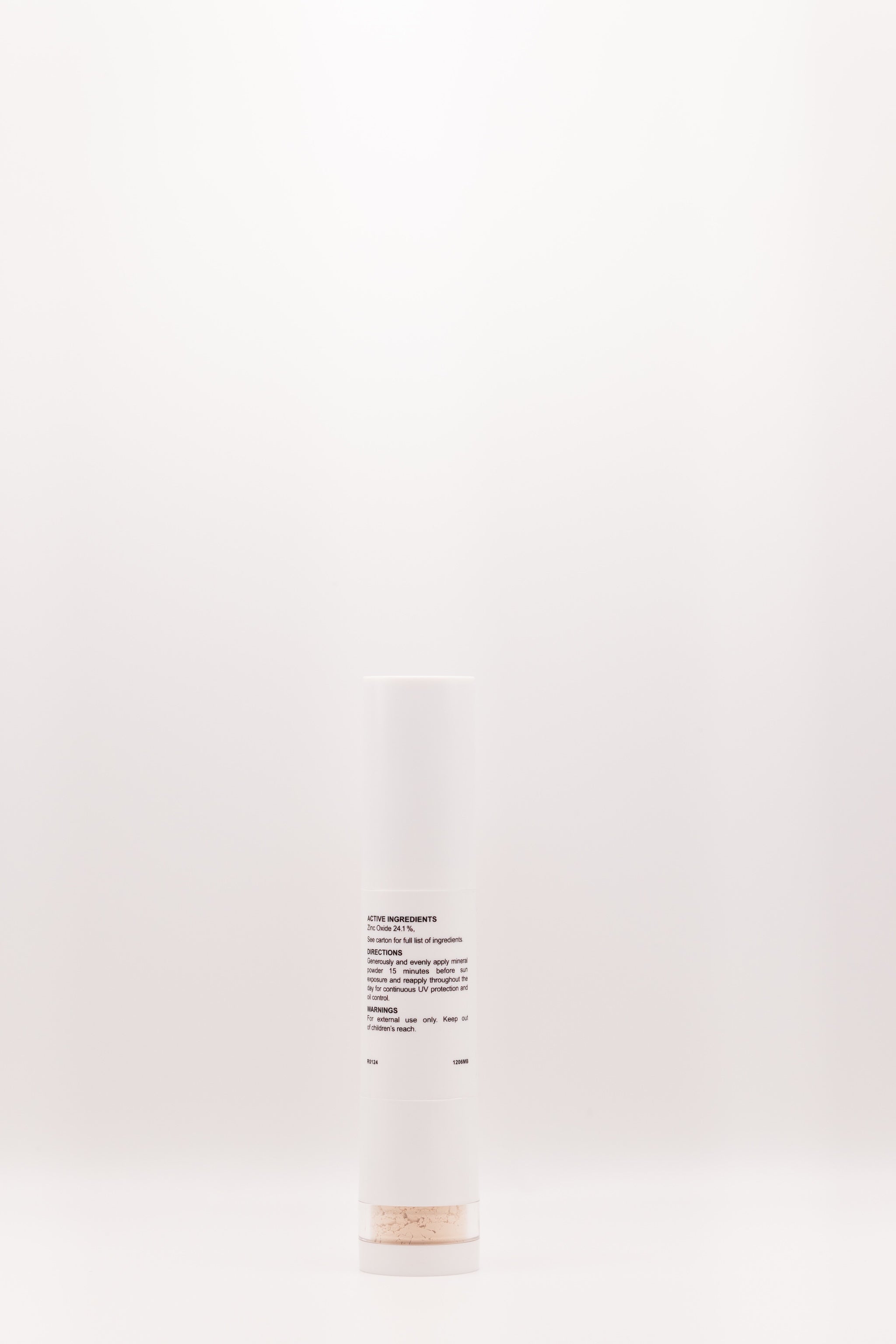 Back label of Shade Shield Portable Powder SPF 30 by The Parlour featuring product information and mineral sunscreen details in portable brush applicator packaging