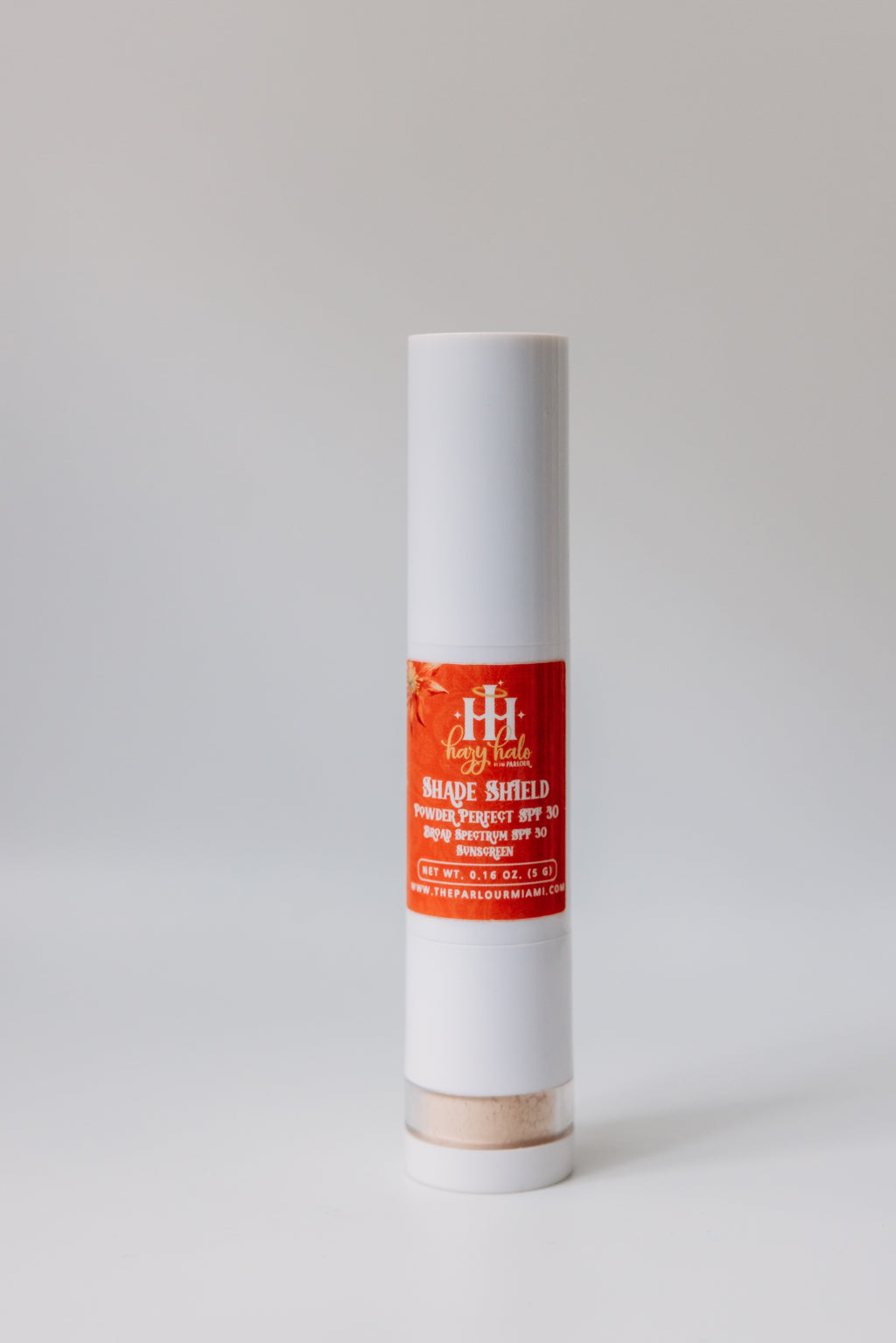 Shade Shield Portable Powder SPF 30 by The Parlour with cap closed featuring mineral sun protection and oil control in a portable brush-on powder sunscreen