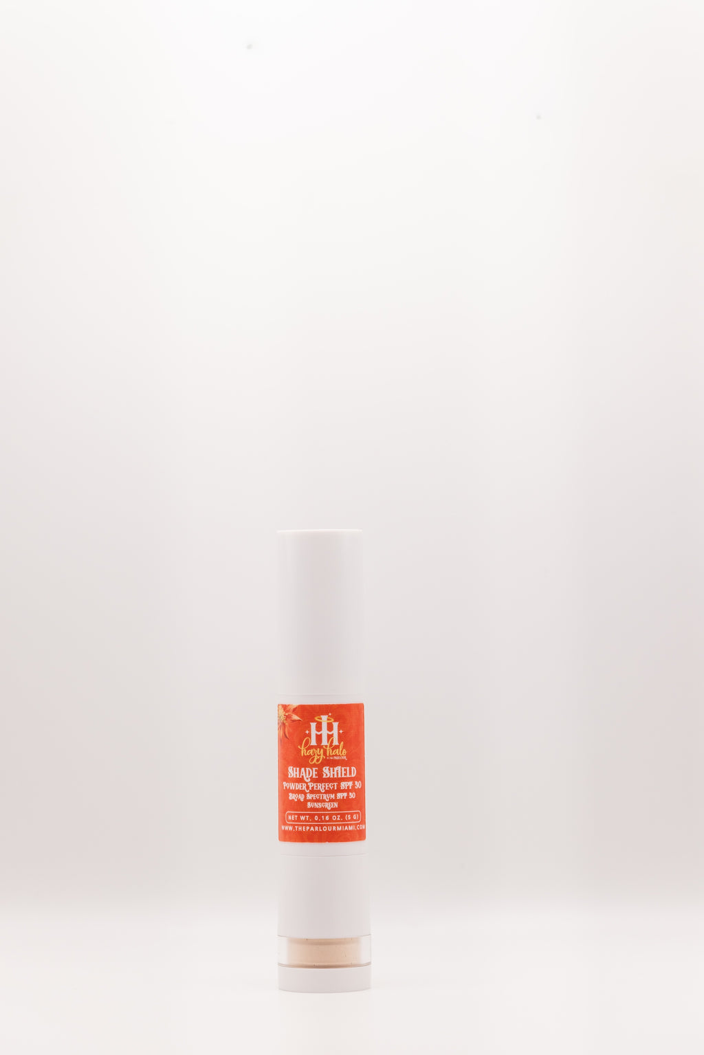 Shade Shield Portable Powder SPF 30 by The Parlour with cap on featuring mineral sun protection and oil control in a portable brush-on powder sunscreen