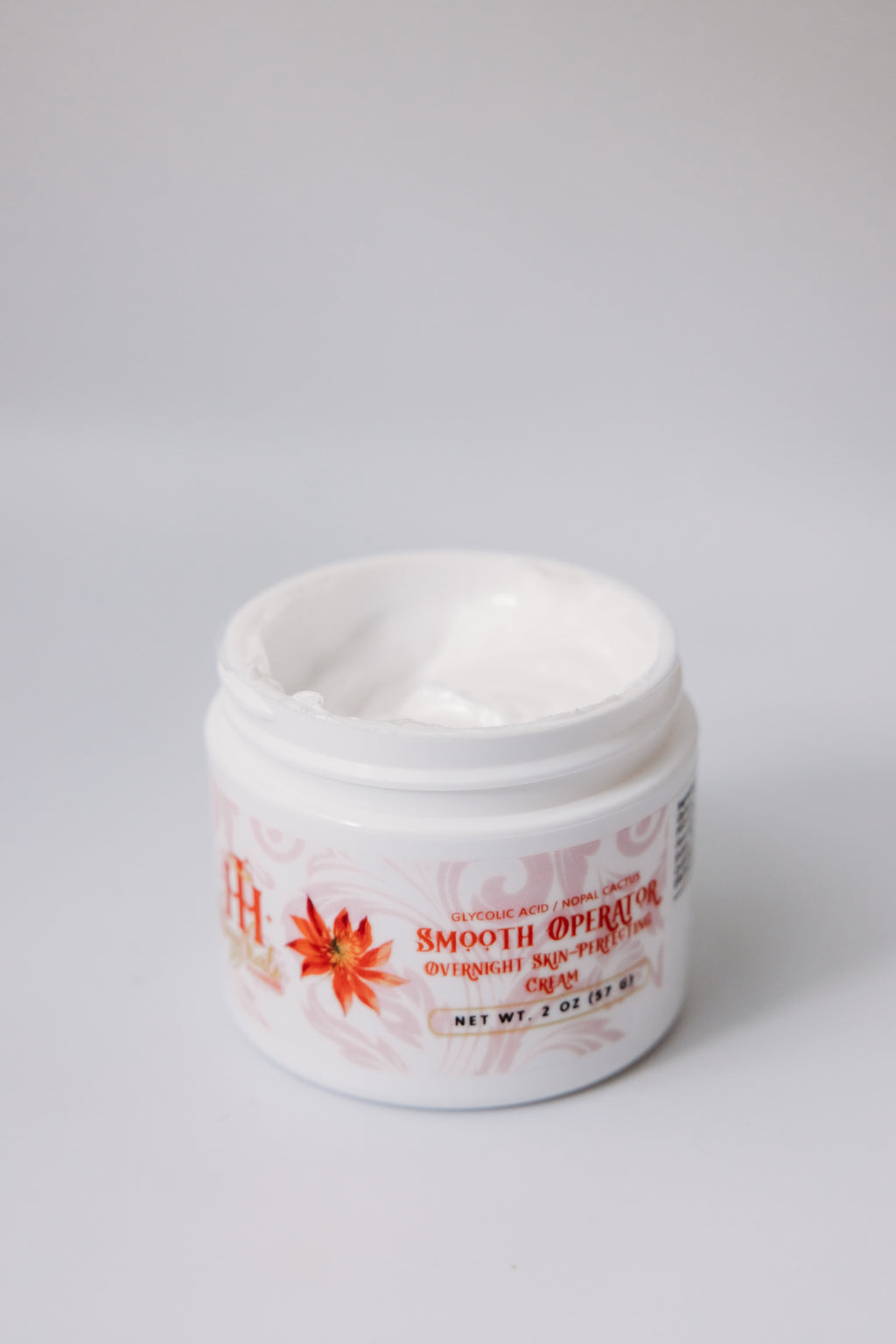 Smooth Operator Overnight Skin-Perfecting Cream by The Parlour featuring glycolic acid for exfoliating dull skin, refining texture, and improving radiance overnight