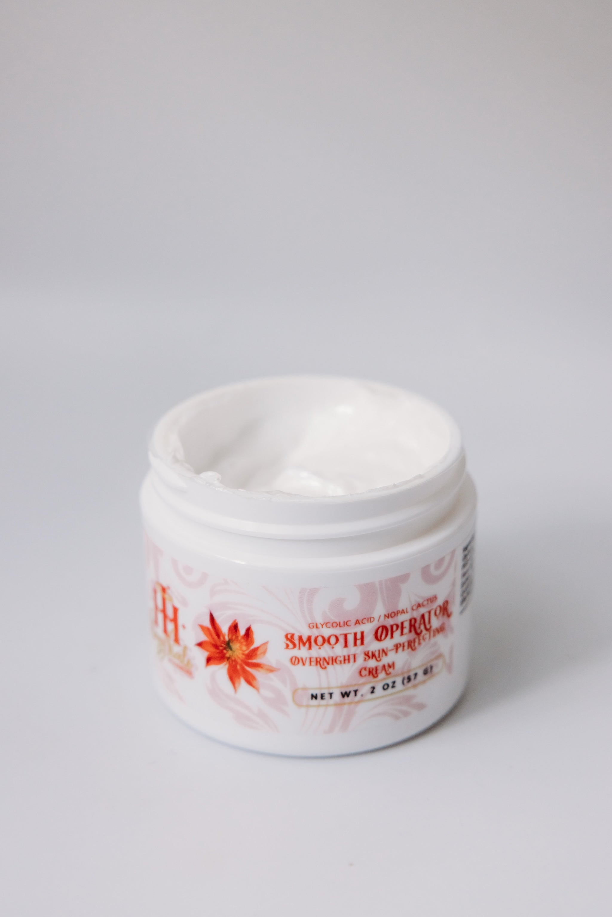 Smooth Operator Overnight Skin-Perfecting Cream by The Parlour featuring glycolic acid for exfoliating dull skin, refining texture, and improving radiance overnight