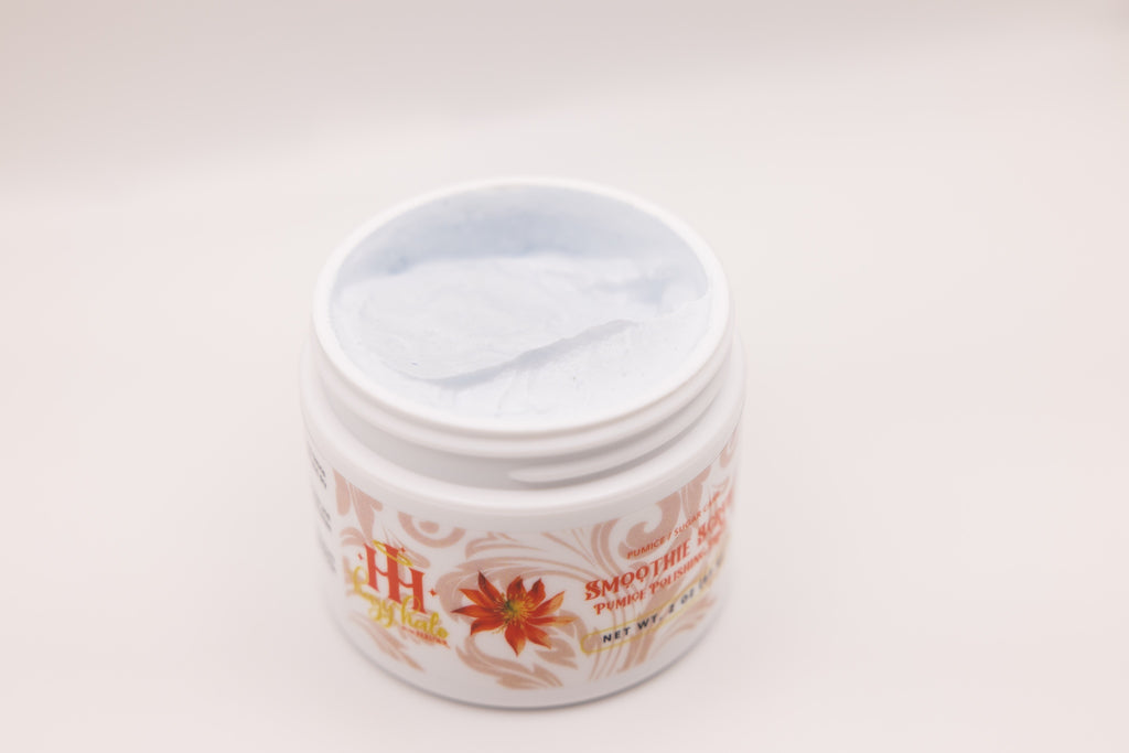 Open jar of Smoothie Scrub pumice polishing paste by The Parlour showing creamy exfoliating texture for smoothing rough skin, brightening dull complexion, and refining uneven texture